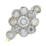 A brilliant-cut diamond floral cluster ring.Estimated total diamond weight 0.80ct,