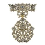 A rose-cut diamond brooch.Estimated total diamond weight 2.50cts.Length 7.4cms. 32.9gms.