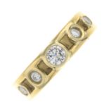 An 18ct gold brilliant-cut diamond band ring.Estimated total diamond weight 0.40ct,