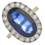 A synthetic sapphire and diamond cluster ring.Estimated total diamond weight 0.80ct,