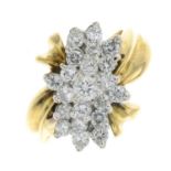 An 18ct gold brilliant-cut diamond cluster ring.Estimated total diamond weight 1.10cts,