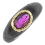 A ruby and black enamel dress ring.Ruby calculated weight 0.79ct,