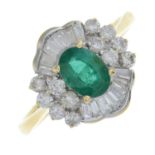 An 18ct gold emerald and vari-cut diamond dress ring.Emerald calculated weight 0.91ct based on