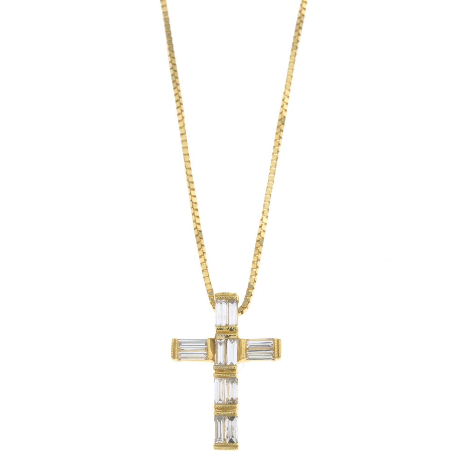 A baguette-cut diamond cross,