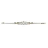 A mid 20th century old-cut diamond bar brooch.Estimated total diamond weight 0.35ct,
