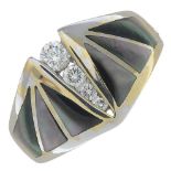 An 18ct gold brilliant-cut diamond and mother-of-pearl dress ring.Estimated total diamond weight