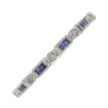 A platinum sapphire and brilliant-cut diamond half eternity ring.Total sapphire weight 0.15ct.Total
