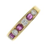 An 18ct gold ruby and brilliant-cut diamond half eternity ring.Estimated total diamond weight