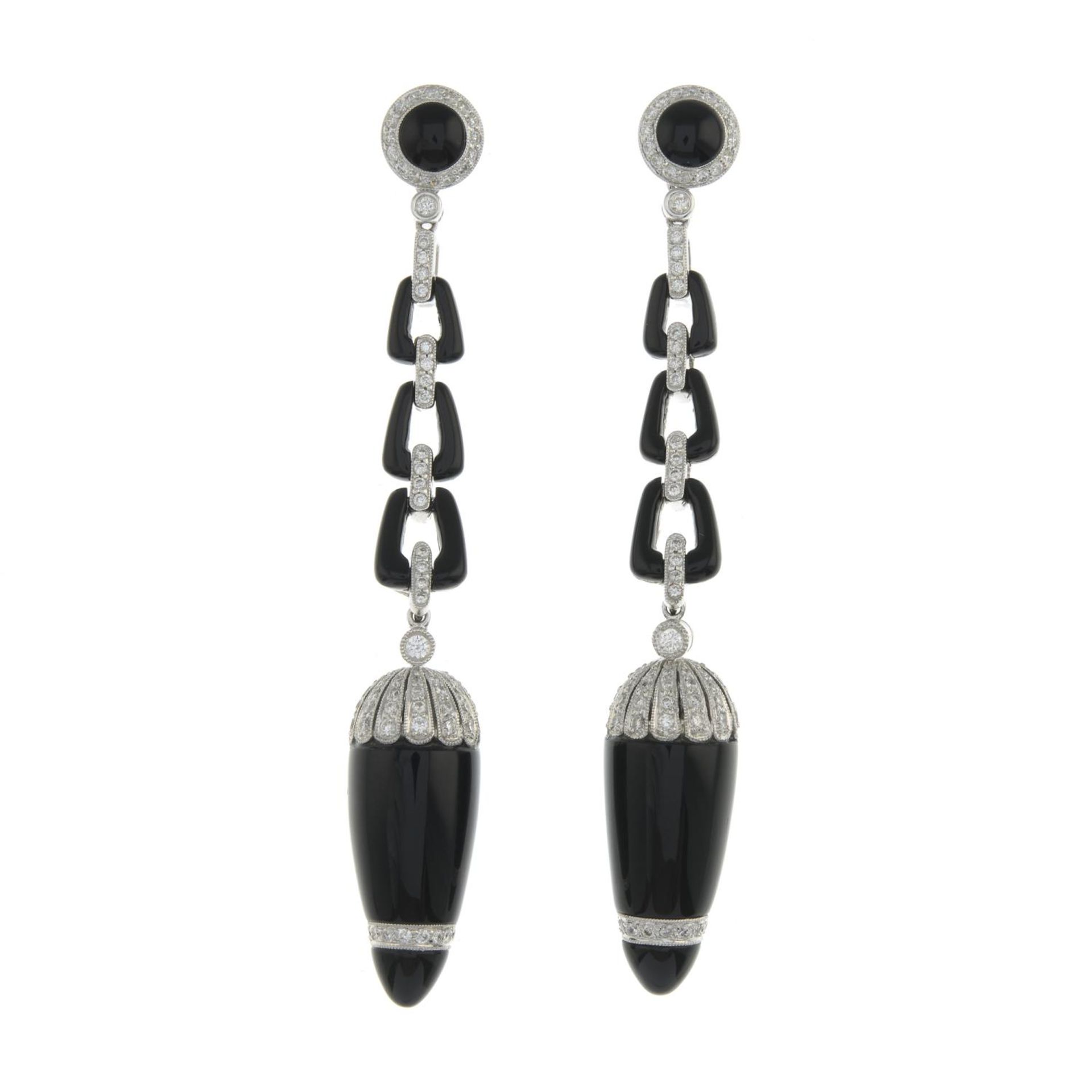 A pair of onyx and brilliant-cut diamond drop earrings.Total diamond weight 0.86ct,