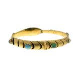 A gem -set snake hinged bangle.Gems include diamonds,