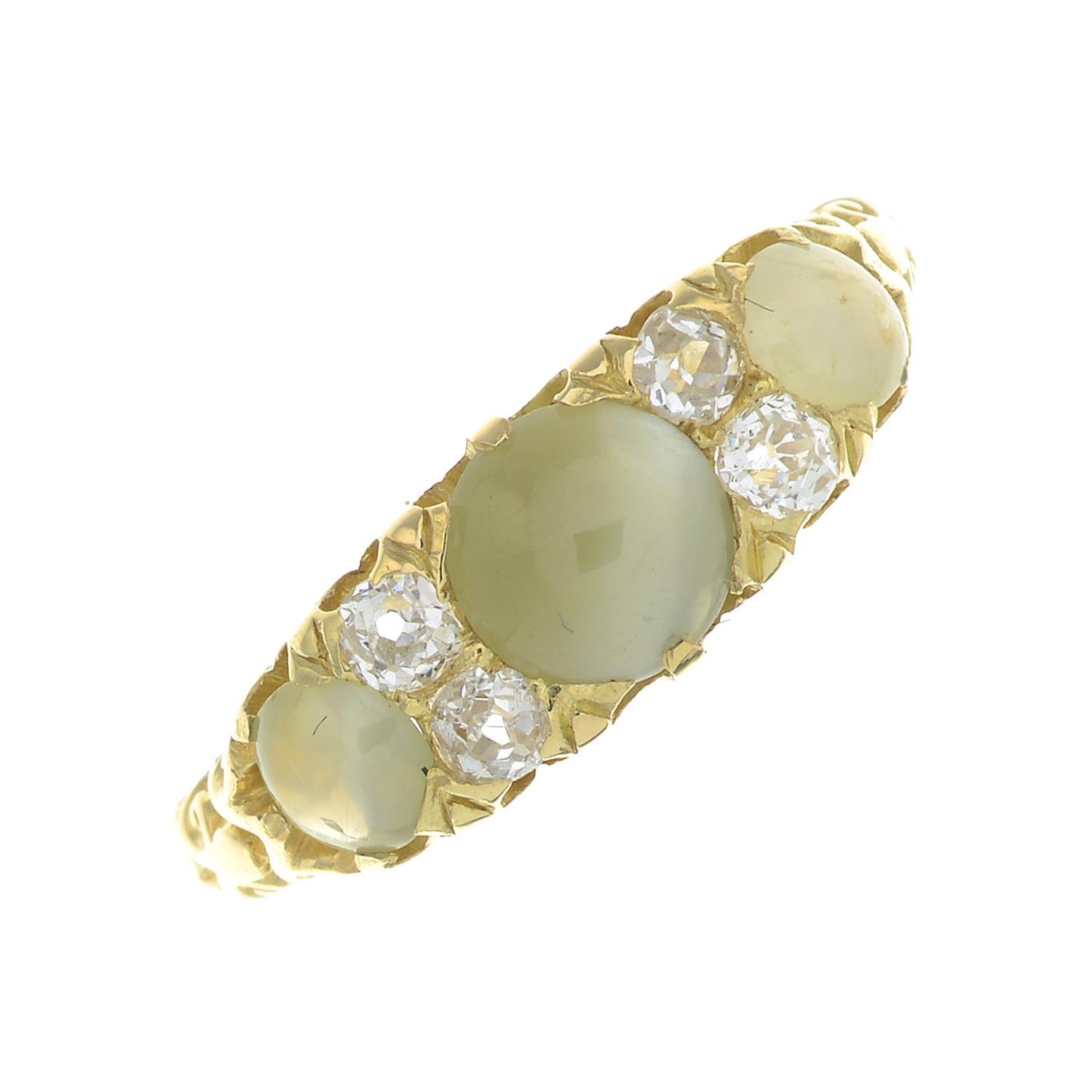 A cat's eye chrysoberyl three-stone ring,