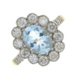 An aquamarine and brilliant-cut diamond cluster ring.Aquamarine calculated weight 1.83cts,