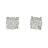 A pair of 18ct gold brilliant-cut diamond single-stone stud earrings.Estimated total diamond weight