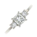 A platinum square-shape diamond three-stone ring.Total diamond weight 0.74ct,