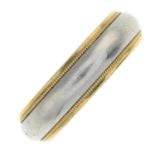 A platinum and 18ct gold band ring,