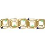 A gem-set bracelet.One gem deficient.Gems include lapis lazuli,
