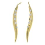 A pair of 18ct gold brilliant-cut diamond curved earrings.Estimated total diamond weight