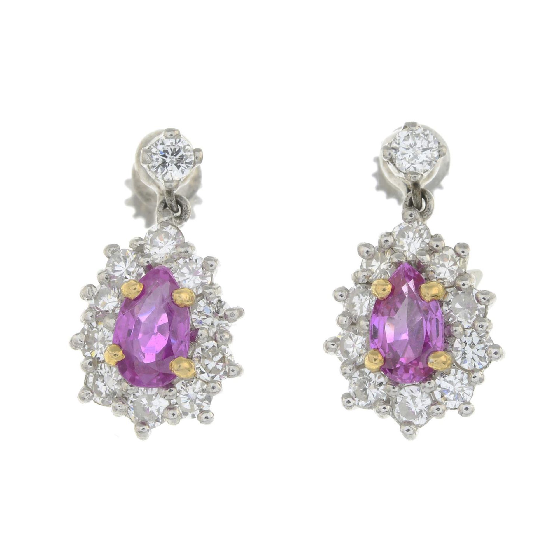A pair of Burmese pink sapphire and brilliant-cut diamond cluster earrings.Verbal from GCS,