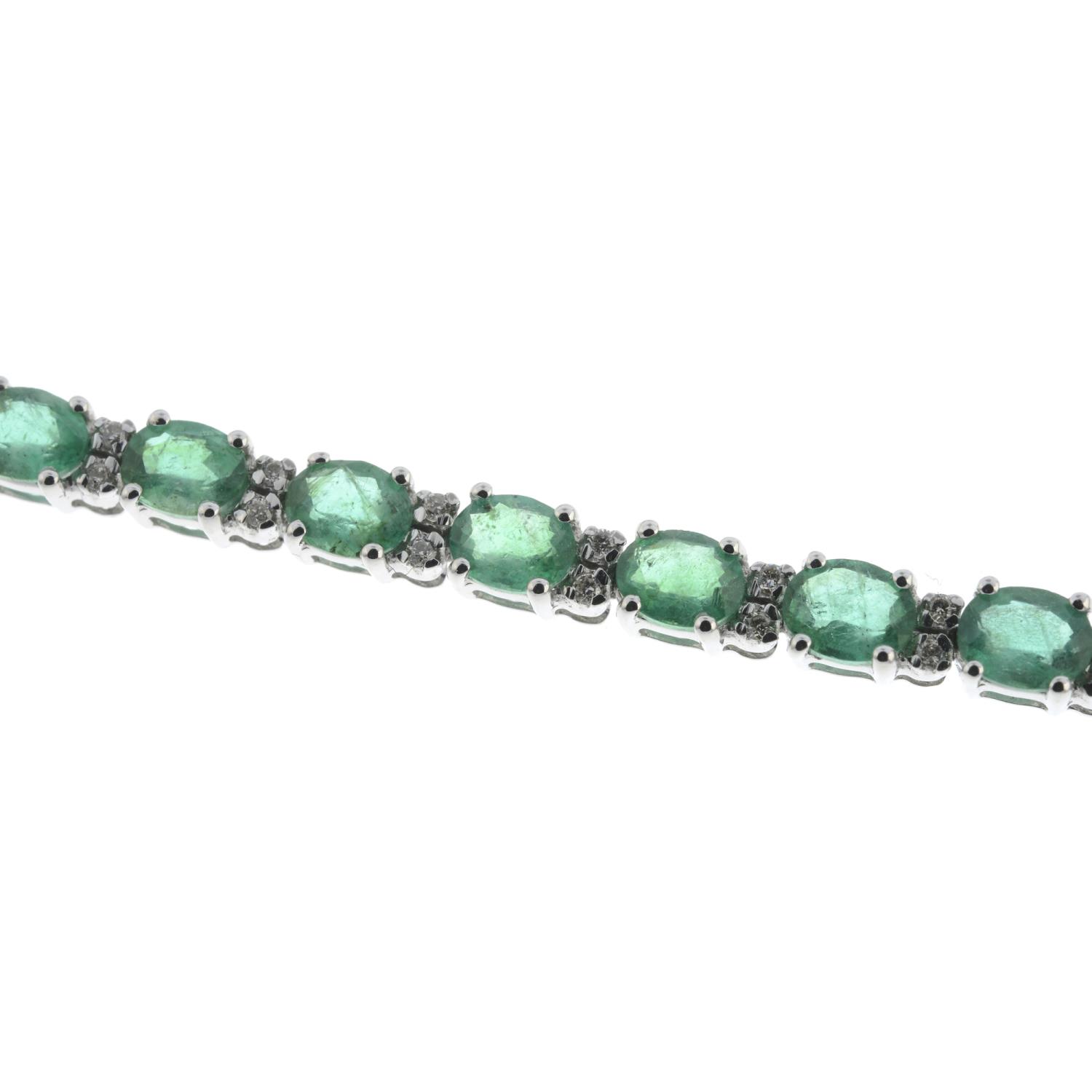 An 18ct gold emerald and brilliant-cut diamond line bracelet.Emerald weight 6.41cts.Diamond weight - Image 2 of 4