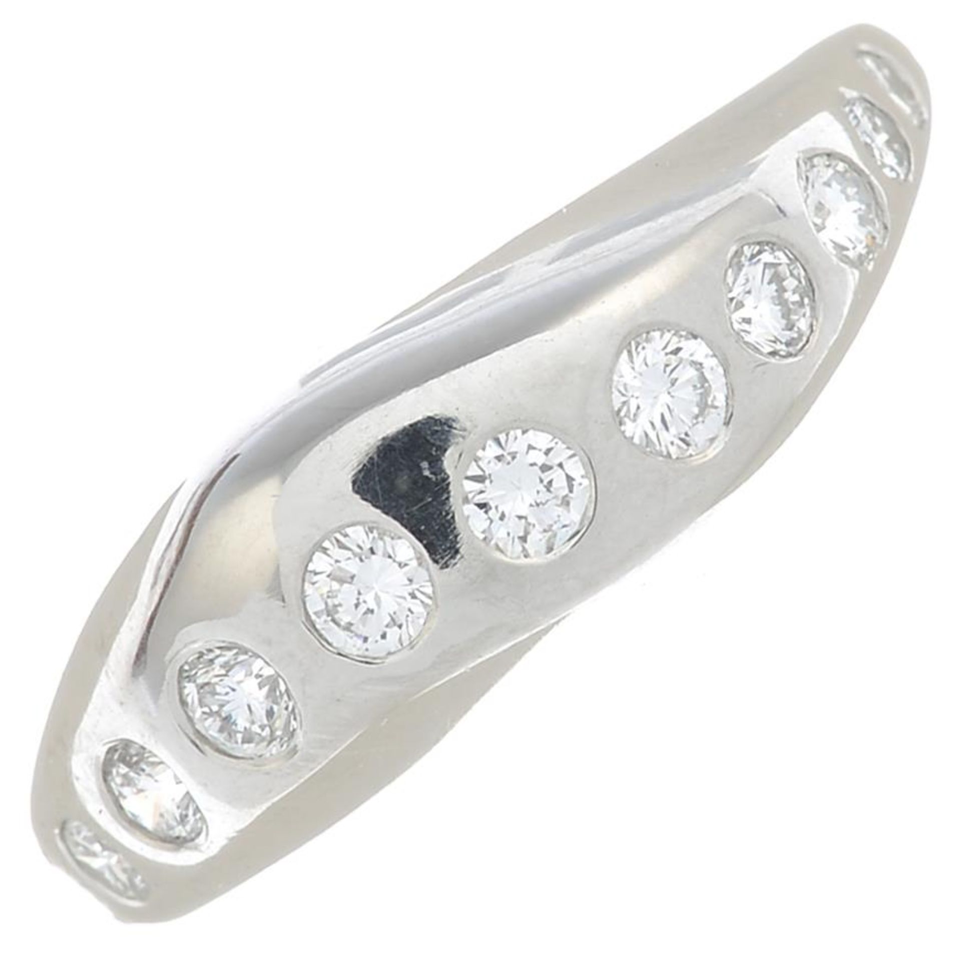 A platinum brilliant-cut diamond band ring.Estimated total diamond weight 0.55ct.Hallmarks for