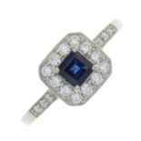 A platinum sapphire and brilliant-cut diamond cluster ring.Sapphire weight 0.52ct.Total diamond