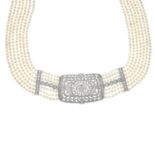 A seven-row cultured pearl choker, with single-cut diamond floral panel and highlights.