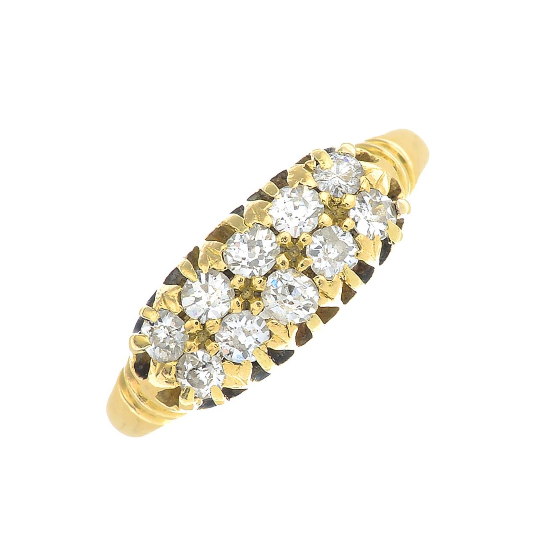 An early 20th century 18ct gold old-cut diamond dress ring.Estimated total diamond weight