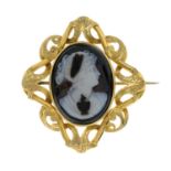 An early 20th century gold sardonyx cameo brooch, carved to depict Demeter.Length 4.3cms.