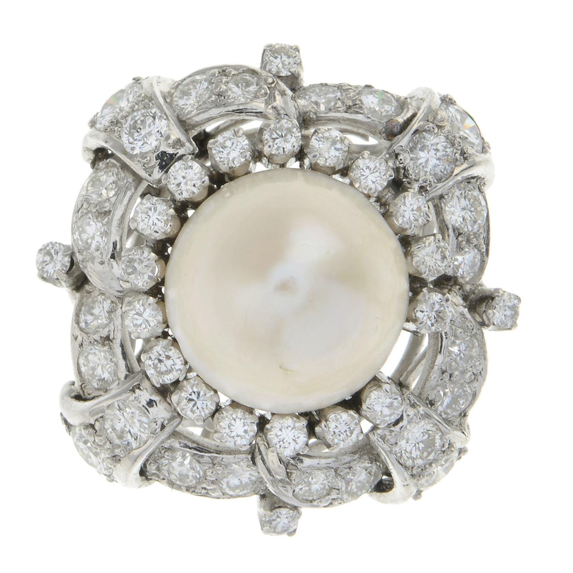 A cultured pearl and brilliant-cut diamond dress ring.AF.Cultured pearl measuring approximately