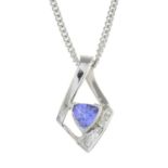 A tanzanite and diamond pendant,