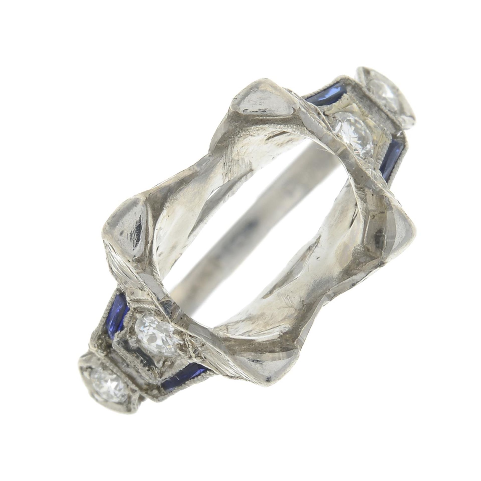 A diamond and blue gem ring mount.Estimated total diamond weight 0.15ct,