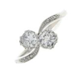 A diamond two-stone ring.Estimated total diamond weight 0.50ct,