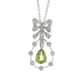 A peridot and diamond pendant, suspended from a chain.Peridot weight 0.50ct, stamped to reverse.