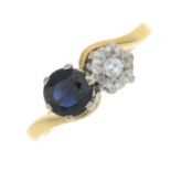 An 18ct gold sapphire and diamond two-stone ring.Hallmarks for London, 1977.Ring size P1/2.