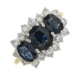 A sapphire and diamond dress ring.Estimated total diamond weight 0.25ct.