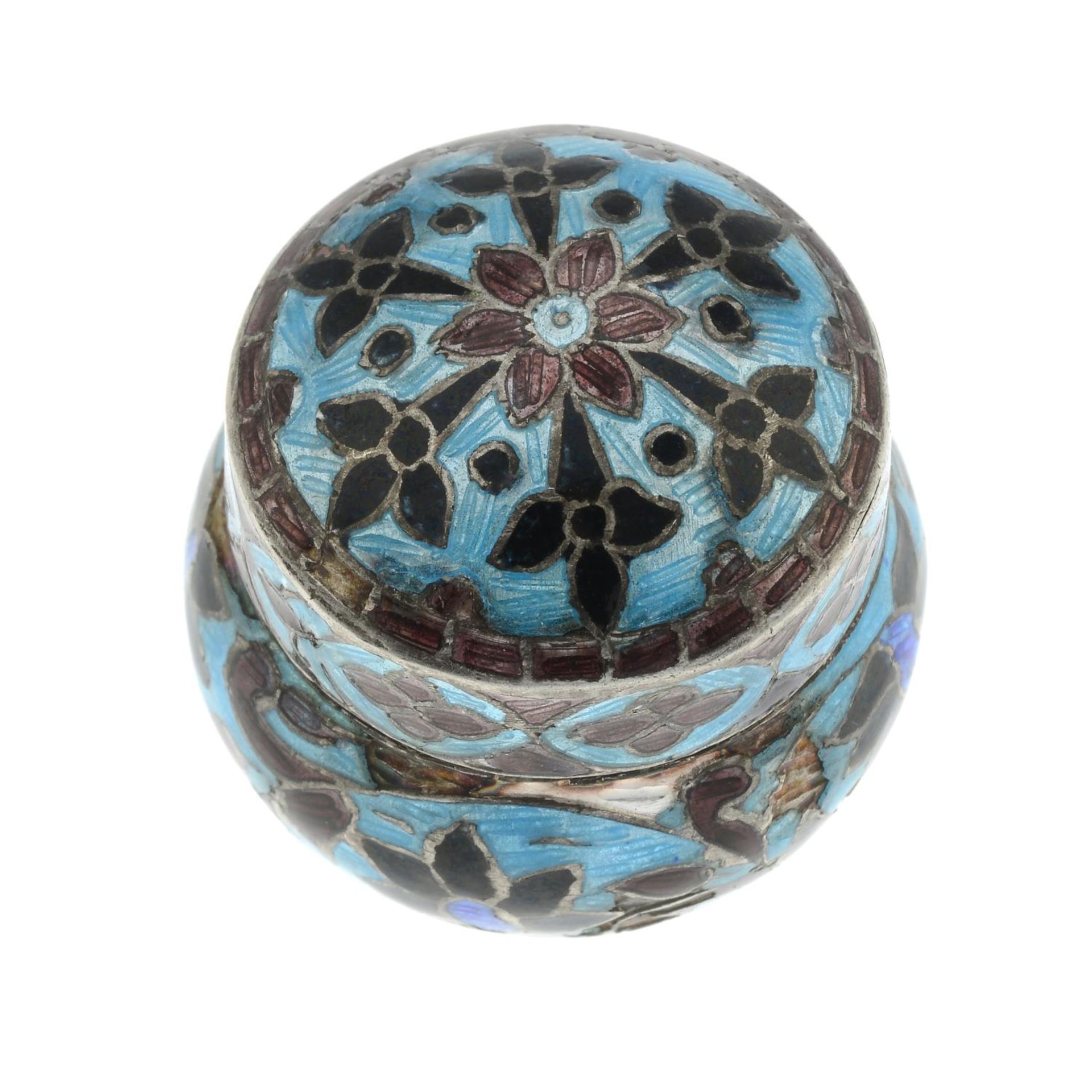 A cloisonné enamel pill box.Stamped 925.Diameter 3cms.