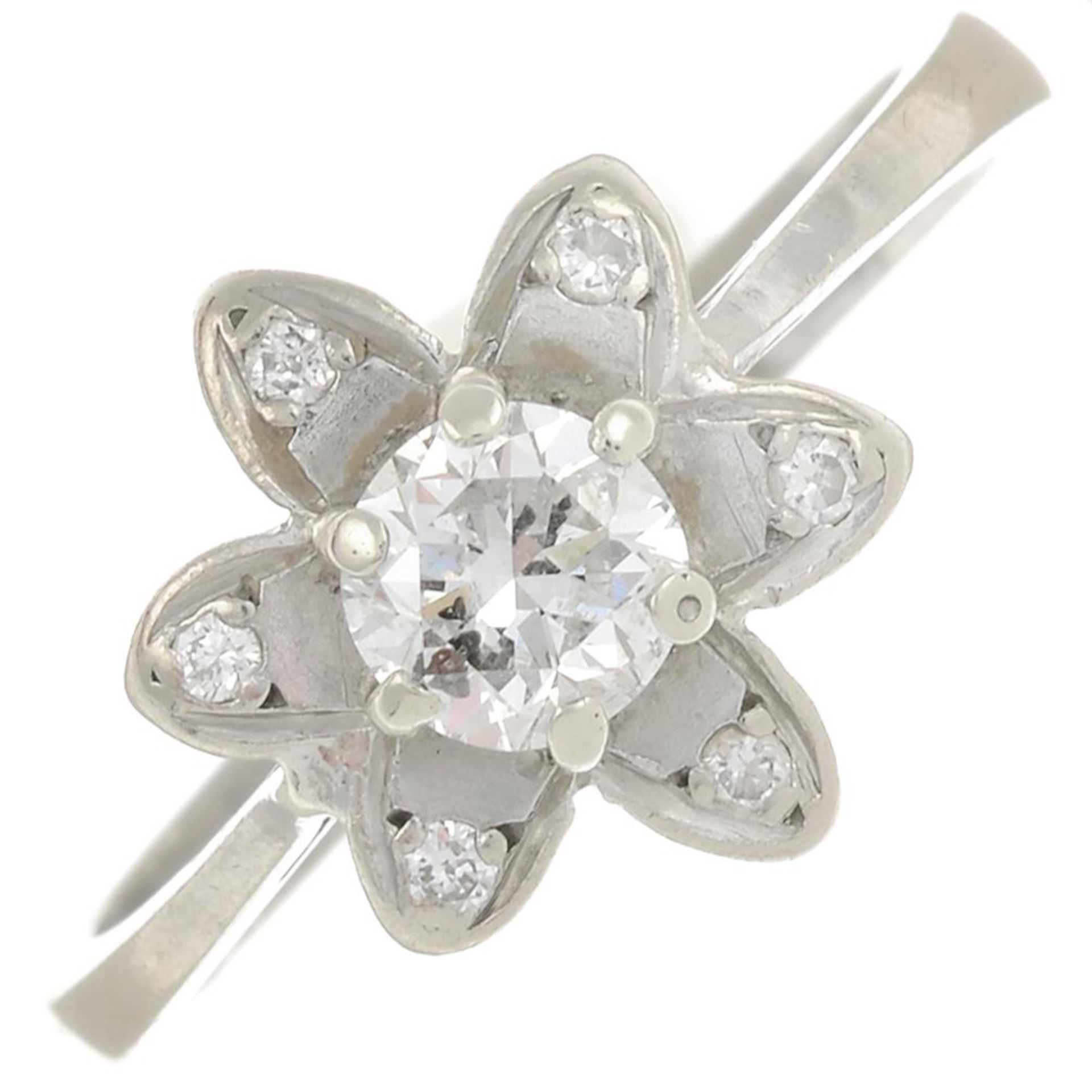 A brilliant-cut diamond floral cluster ring.Principal diamond estimated weight 0.50ct,