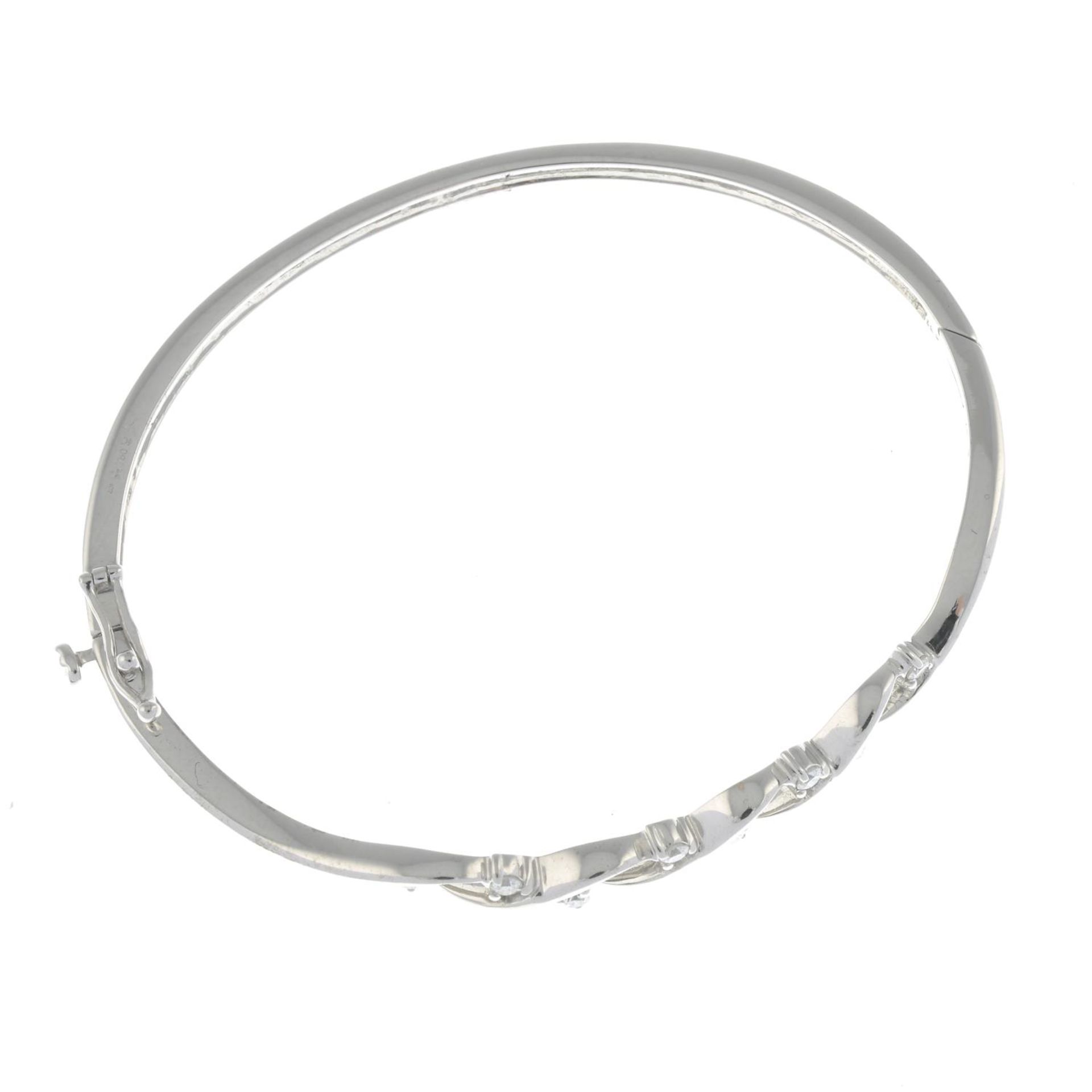 A diamond hinged bangle. - Image 2 of 2