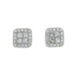 A pair of diamond cluster stud earrings.Estimated total diamond weight 0.55ct,