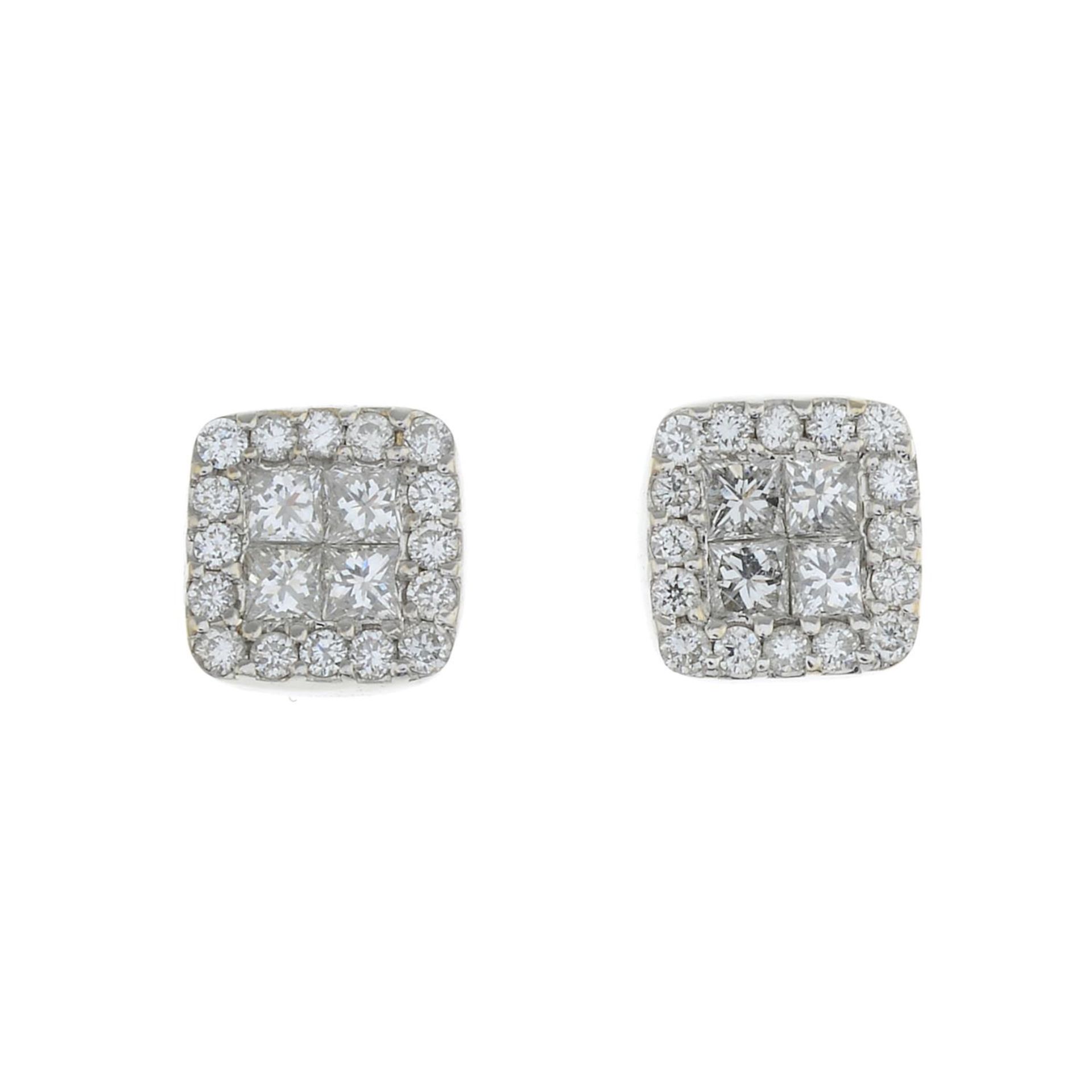 A pair of diamond cluster stud earrings.Estimated total diamond weight 0.55ct,