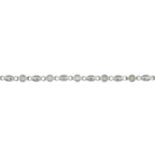 A diamond line bracelet.Total diamond weight 0.36ct, stamped to clasp.Stamped 18k.Length 16.5cms.