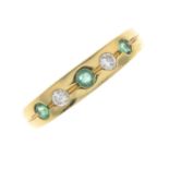 An 18ct gold emerald and diamond five-stone ring.