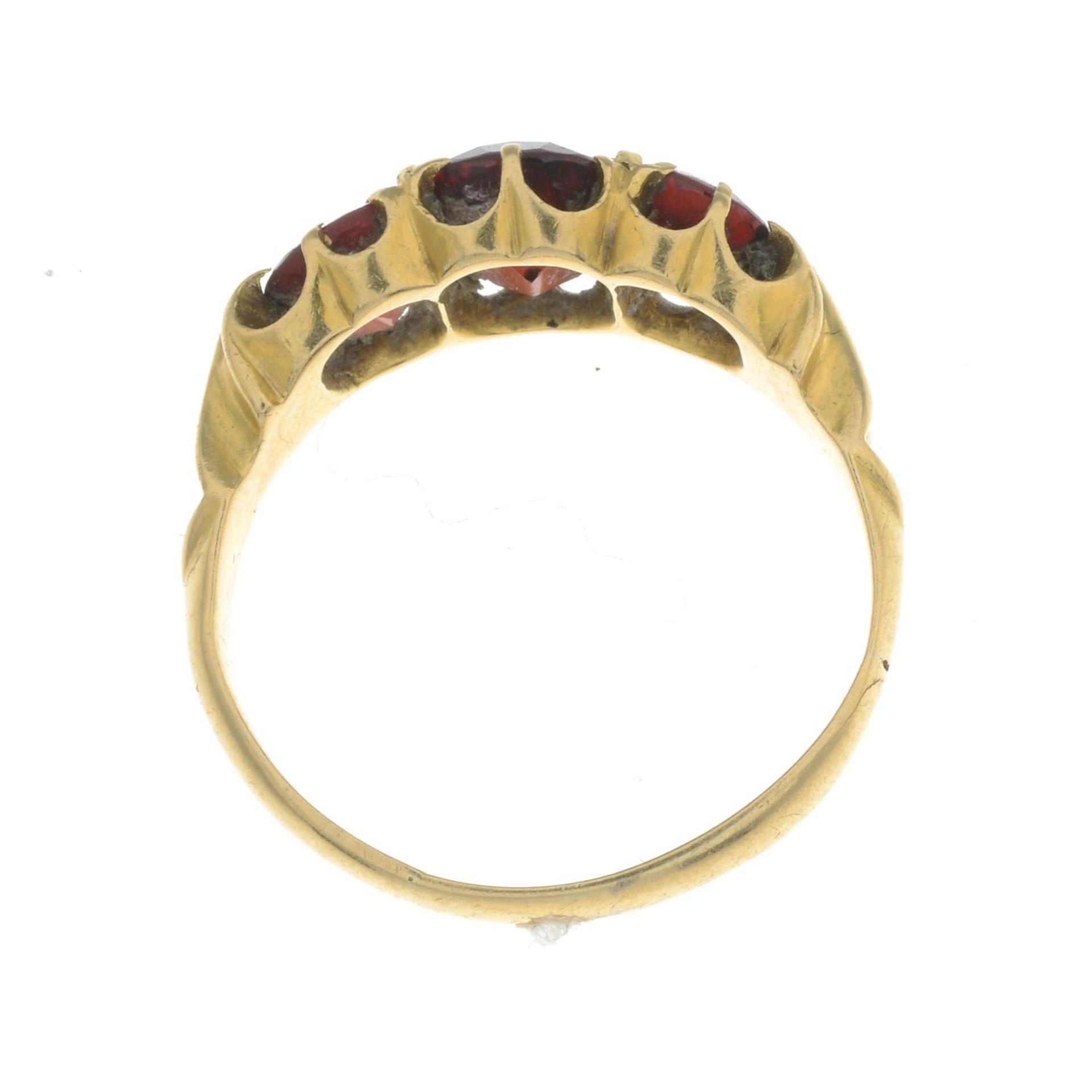 A garnet three-stone ring, - Image 2 of 2