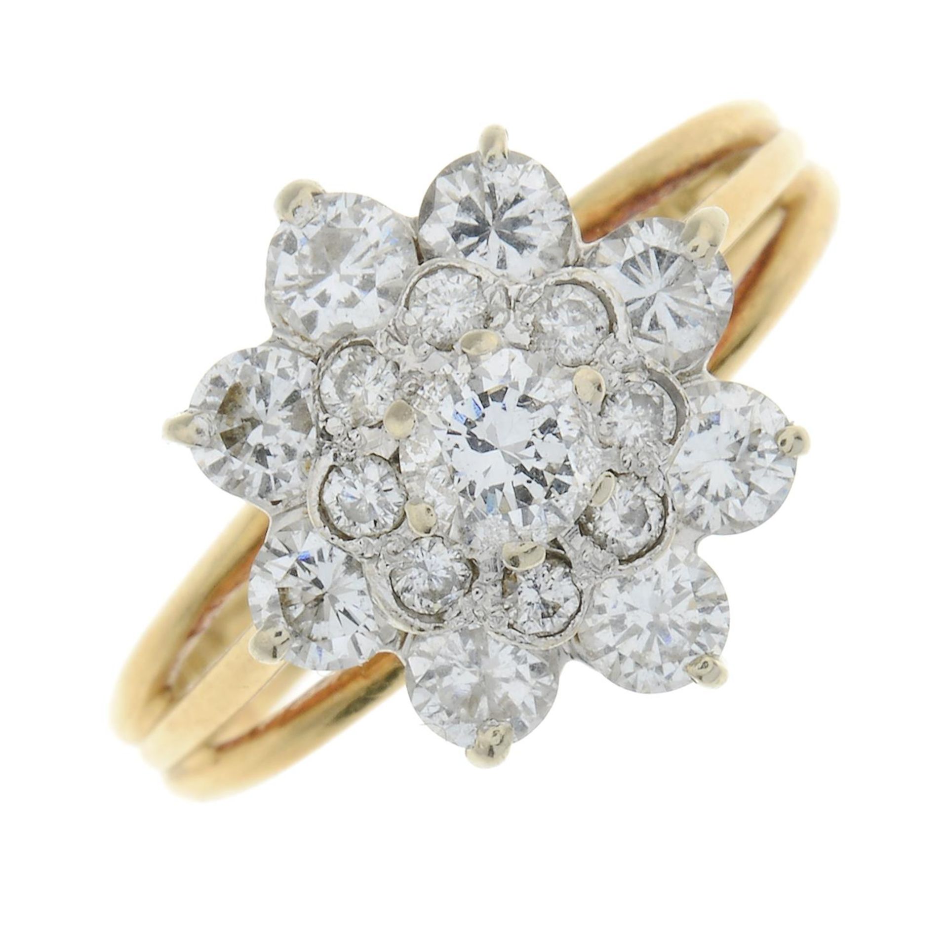 An 18ct gold diamond cluster ring.Estimated total diamond weight 1.20cts,