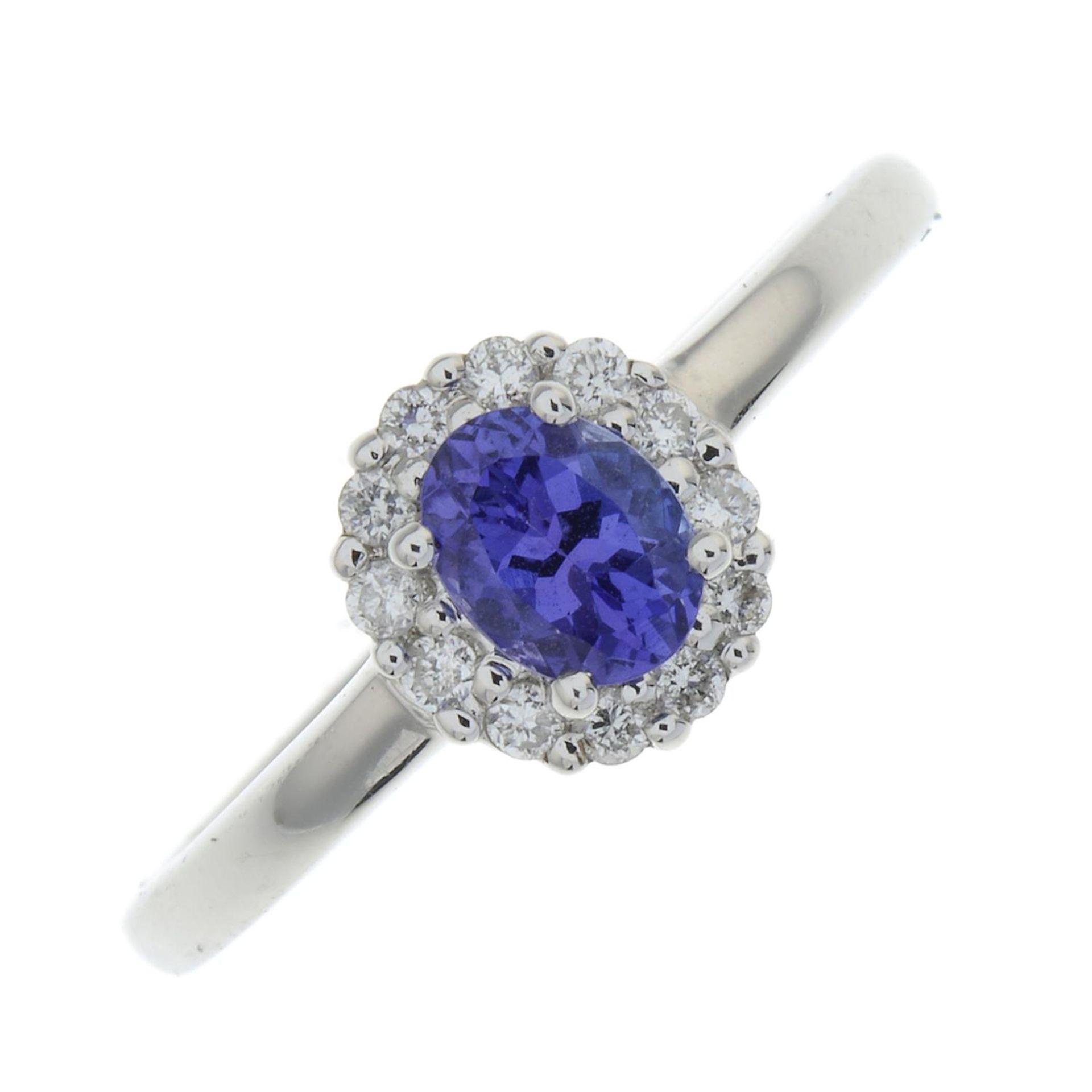 An 18ct gold tanzanite and diamond cluster ring.