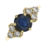 An 18ct gold sapphire and diamond ring.Estimated total diamond weight 0.60ct,