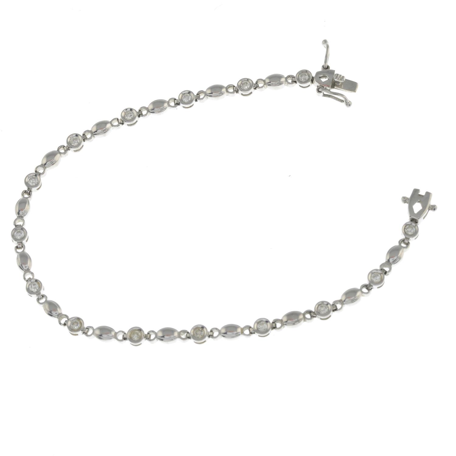 A diamond line bracelet.Total diamond weight 0.36ct, stamped to clasp.Stamped 18k.Length 16.5cms. - Image 2 of 2