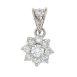 A diamond floral cluster pendant.Estimated total diamond weight 0.50ct,