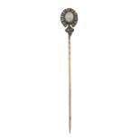 A late 19th century mabe pearl and rose-cut diamond stickpin.Length of stickpin head 1.6cms.