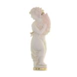 A carved conch shell brooch, depicting Dionysus.Length 8.6cms.